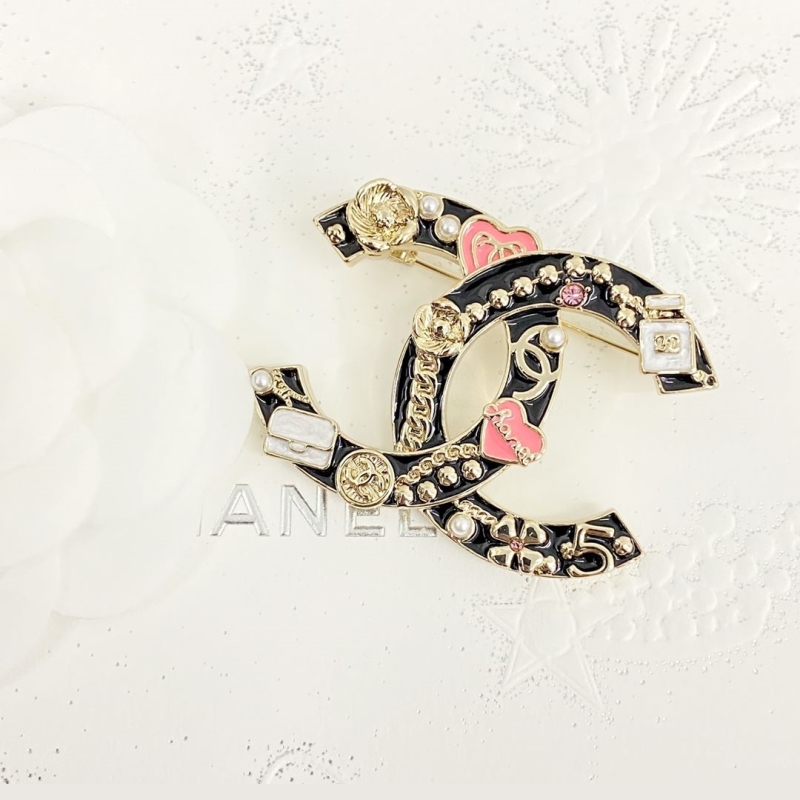 Ch*el brooches